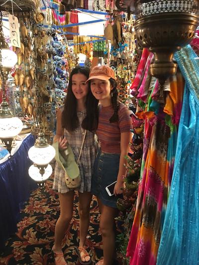 The Gorman sisters explore the Greek wares in the bazaar.