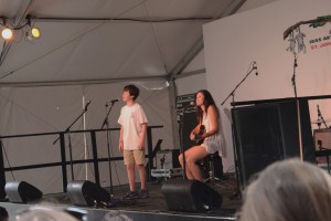 Kinkaid freshman Austin Karowsky performs Ho Hey by the Lumineers with classmate Anna Glickman at the Coffee House, April 3. 