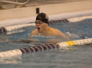 Senior Daniel Bland swims the breaststroke at one of the team’s first meets of the season, hosted by SJS and Lamar. 
