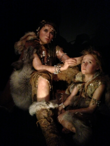 Wax sculptures from the exhibit represent early homo sapiens who were alive at the time the cave was painted.