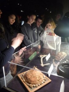 French students view replicas of prehistoric tools at the Houston Museum of Natural Science. Although there is no evidence that the caves were living quarters, tools were found in the caves.