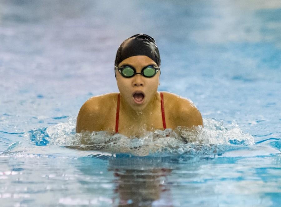 Sophomore Lauren Jhin comes up for air during a race at the team’s first meet at Lamar High School, Nov. 19. 