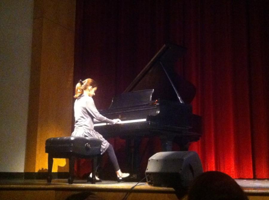 Second grade student Leena Hanson performs a sonnetina on the piano. Maverick Magic hosted performers from kindergarten to Upper School.