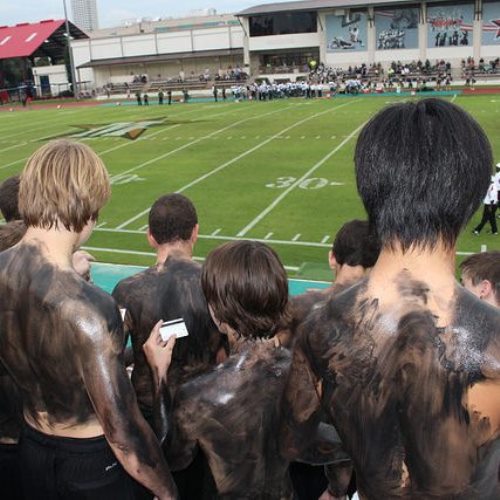 Boys cheer for the Mavericks Friday, Sept. 12.