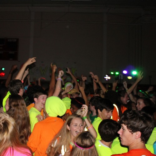 Colors glow, electric music pulses at Homecoming dance