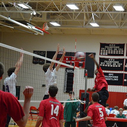 Boys volleyball plays in the gym, where they hope to hang a championship banner after a victory on Saturday.