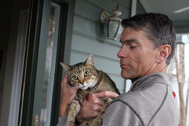 Coach Richie Mercado and his tiger cat Tabby