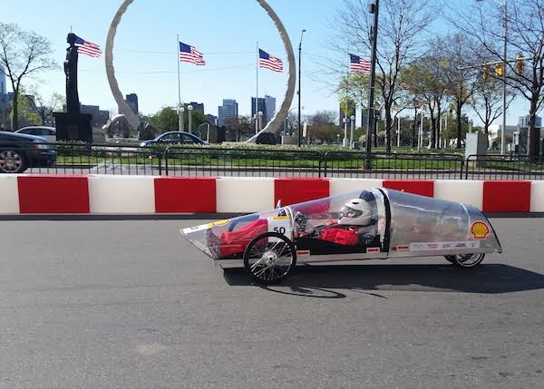 Margaret Trautner steers the car on the track. Using an electric starter, the team doubled their mileage from last year.