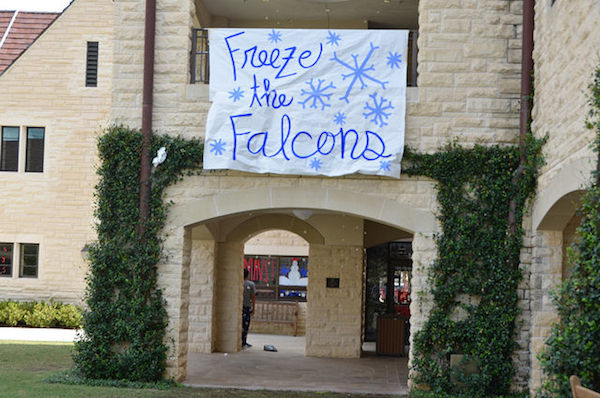 A huge Freeze the Falcons poster hangs outside of the Oculus. 