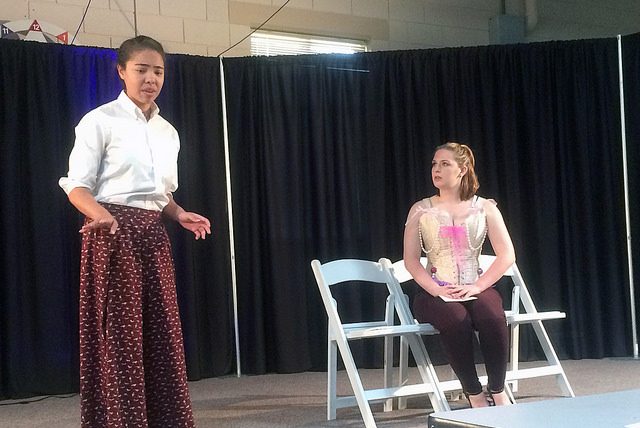 From left: senior Irene Vazquez and junior Nicole Vermeulen reenact a scene from the play Intimate Apparel by Lynn Nottage.