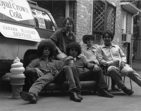 Members of Banana Bender Surprise lounge next to their brown Suburban, the Brown Chariot. Band members included (from left to right): Jason Barker (89), Allen Hill, Conrad Choucroun (94), David Beebe and Gerard Choucroun (89).