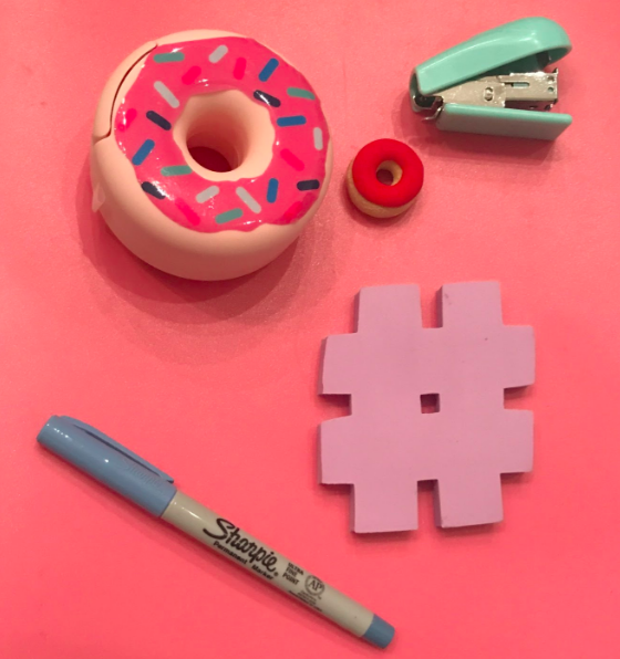 Clockwise from top left: Donut tape dispensers, donut erasers, miniature staplers, hashtag erasers and colorful pens are some of the quirky supplies students use to brighten the school day.