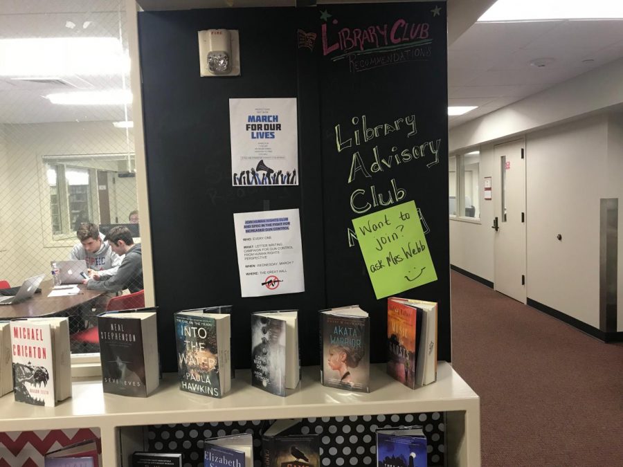 Posters and books on display encourage students to read during the day.