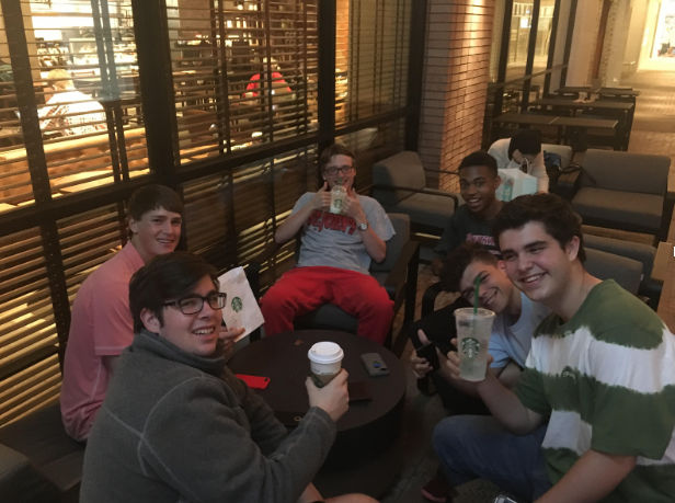 From left: seniors Dylan May, Travis Allday, Mark Laborde, Drew Woodfolk and Julien Fenouil enjoy coffee at the Rice Village Starbucks.