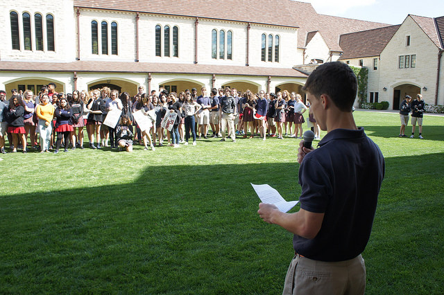 Senior Henry Philpott delivers a speech to the Upper School student body.