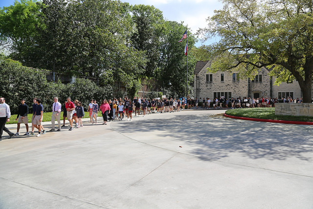 Students and teachers walk throughout the Upper School campus.