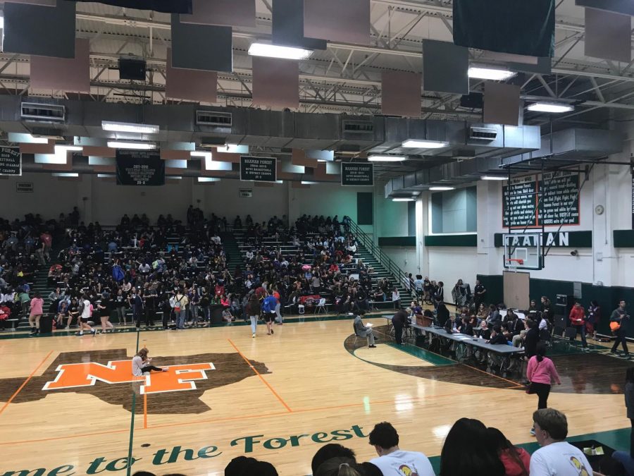 Students gathered in the gym for the volleyball competition.