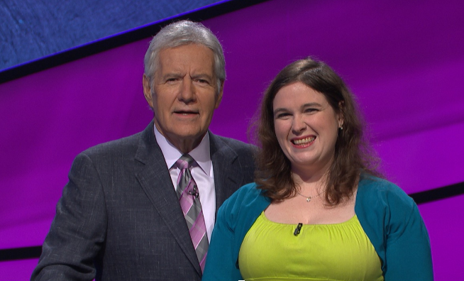 Henkoff stands with Jeopardy! host Alex Trebek.