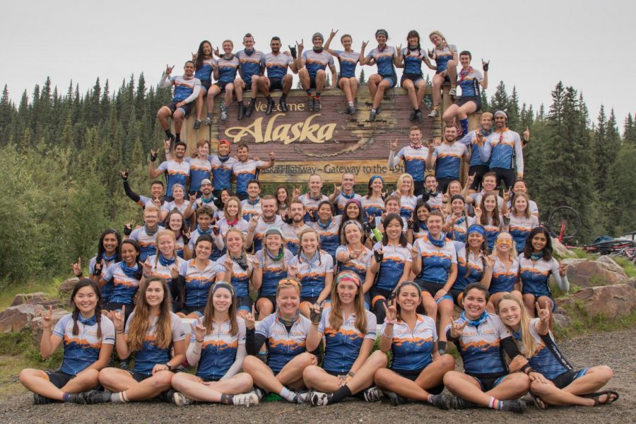 To keep themselves motivated, riders would tell another to find your next Alaska. Here, the group poses in Tok, Alaska. 