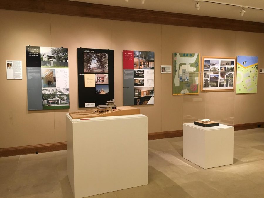 A display wall at the Architecture Exhibit in the Clare Attwell Glassell Gallery. The models, floorplans, and photos on display provided insight into the work done by alumni architects. 
