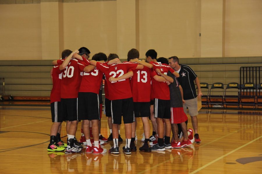 The team huddles before taking on St. Stephens.