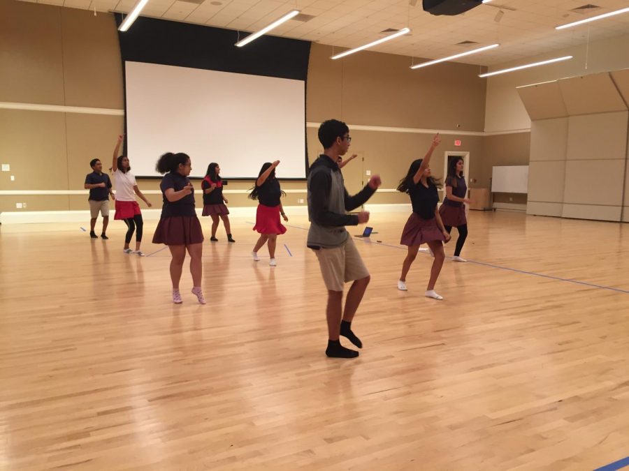 SAAG members rehearse one of their four dances before the assembly.