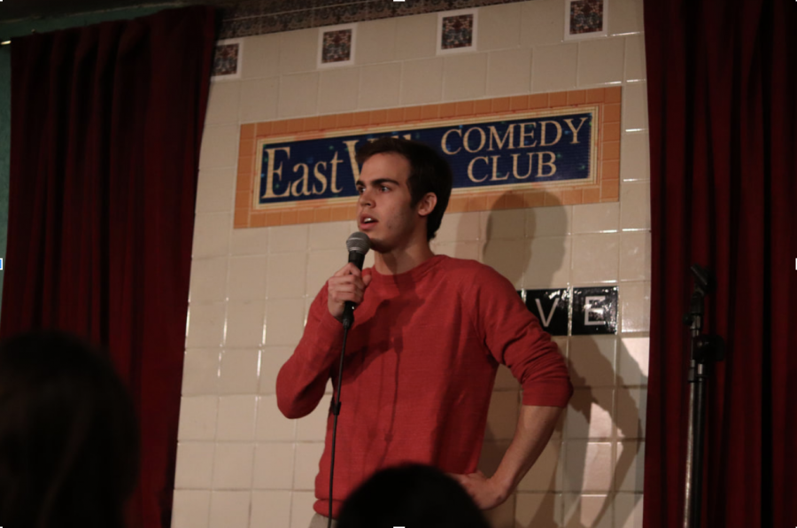 Jake Schick performs a comedy routine at EastVille Comedy Club.