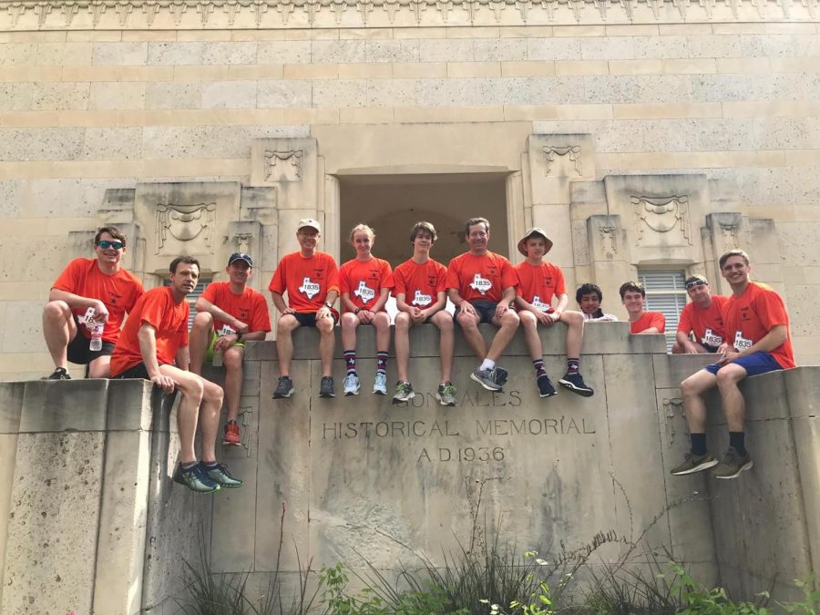 The relay team visits a monument in Gonzales, where the race began.