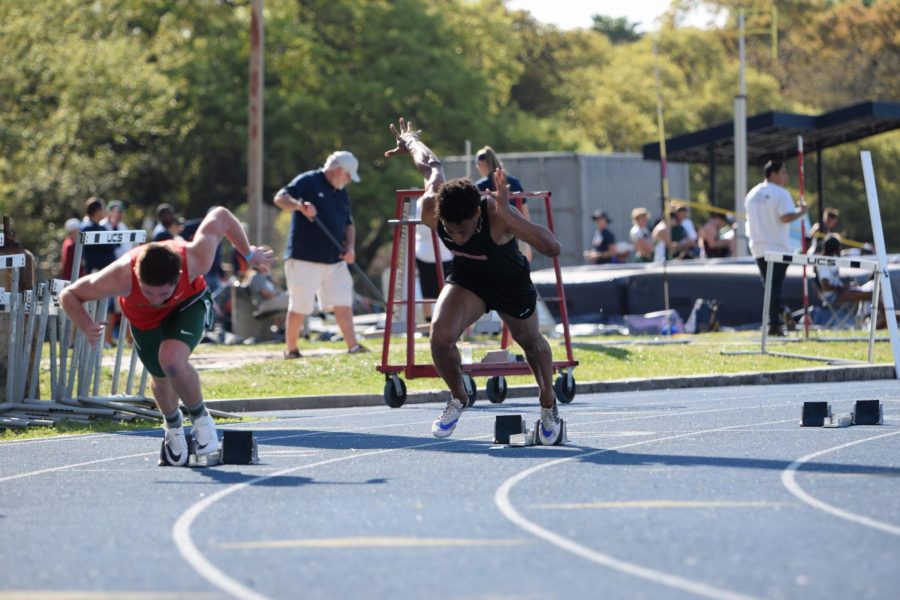 Hooper-Price pushes off the starting bloc at the beginning of his race.