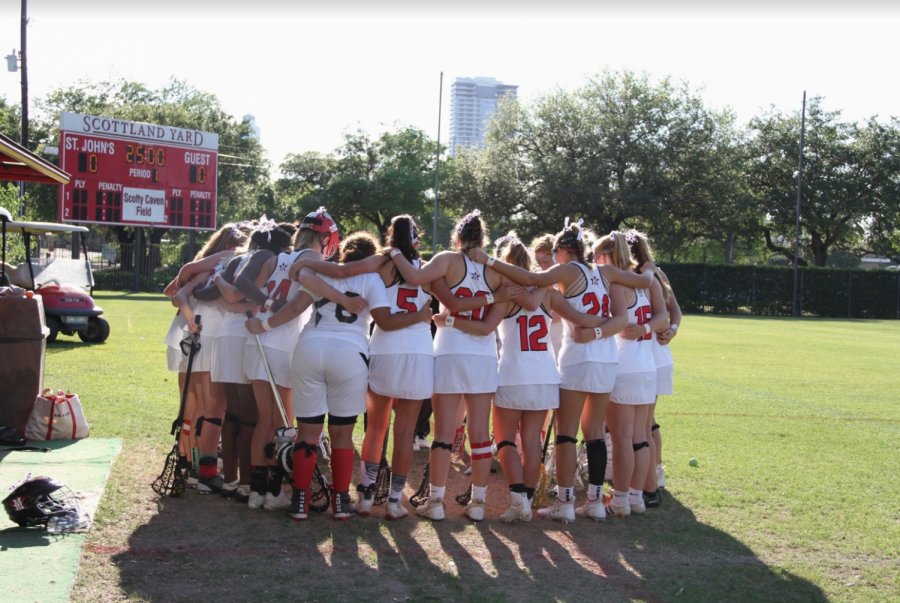 The team prepares to play Lamar in their first game after coach Angie Kensinger and her husband Stuart passed away. 