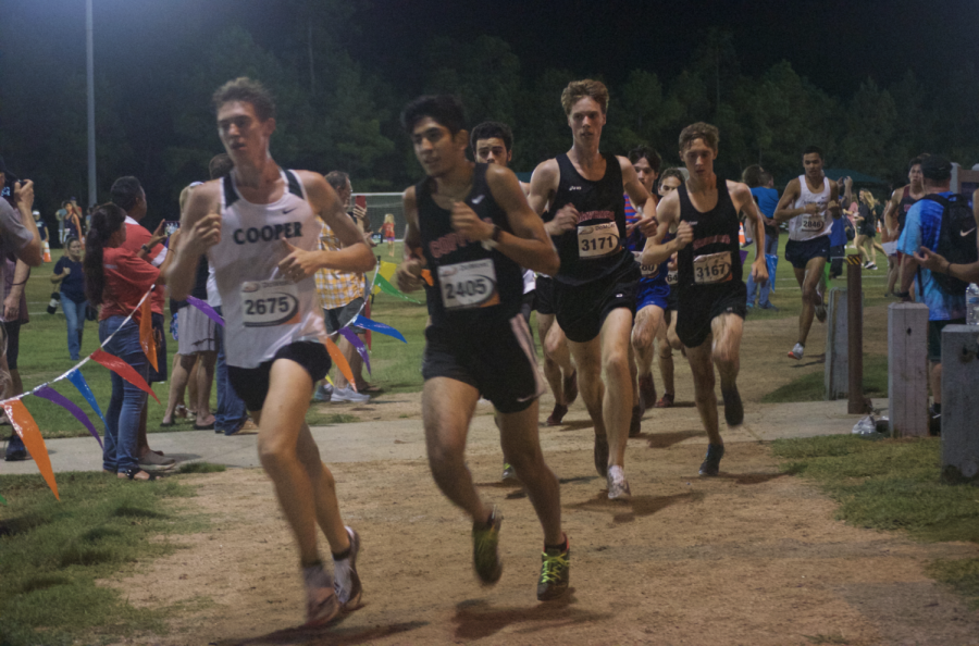 The boys and girls cross-country teams competed in their first race of the season at the Friday Night Lights meet in The Woodlands. 