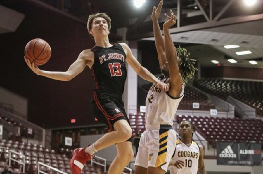 Jackson Peakes scores two of his 31 points during the Nimitz game.