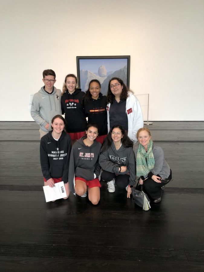 French Seminar students and French teacher Shelley Stein ('88) viewed Surrealist art, including "The Glass Key" by René Magritte.