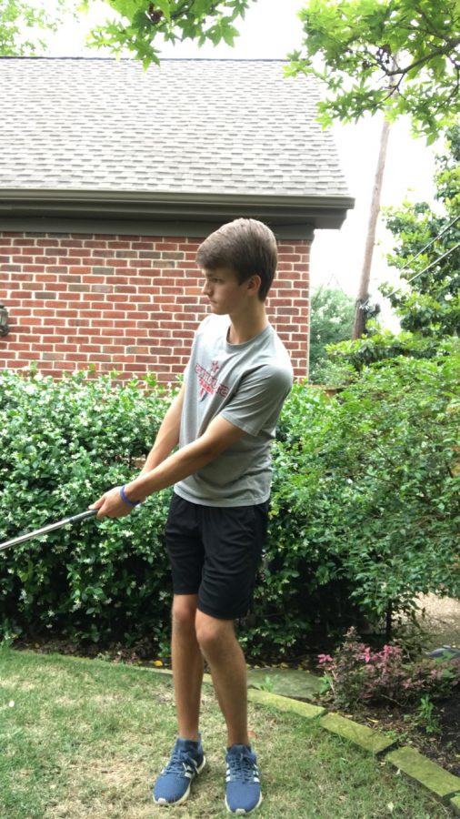 Nelson chips in his backyard.