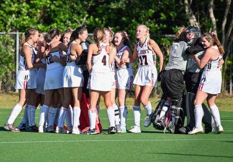 The field hockey team celebrates after winning SPC in 2019. This year, however, the fall SPC season has been cancelled.