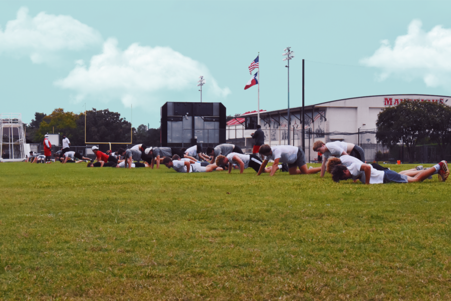 Virgil Campbell, Director of Strength Training & Conditioning, leads the football team in a workout.