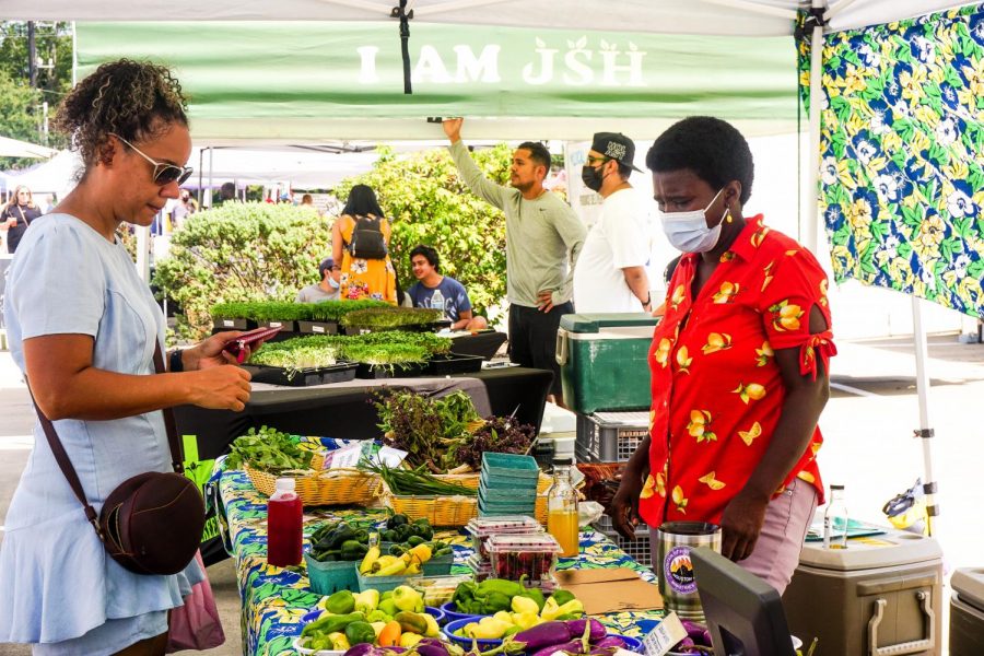 Venders showcase their produce, which is all grown within 180 miles of Houston.