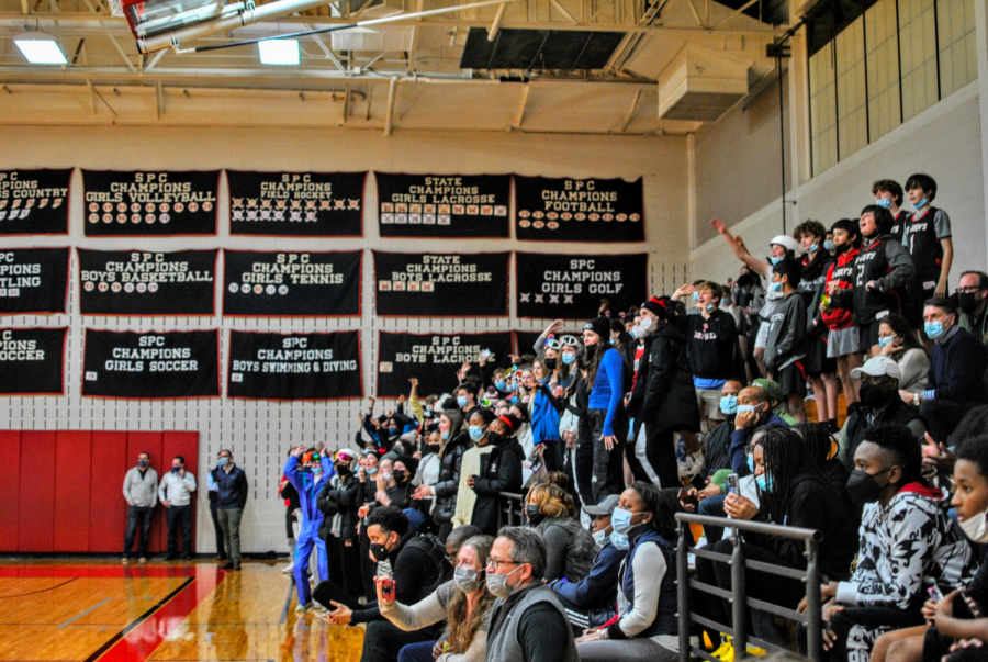 The+student+section+returns+and+dons+ski+goggles+and+beanies+in+support+of+the+Mavericks.