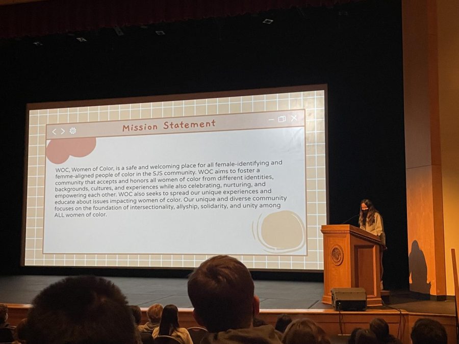 Junior Ananya Das reads WOCs mission statement at the beginning of the assembly. 