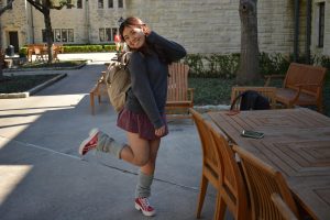 Sophomore Audrey Liu models her red Skechers Heartbeats sneakers and gray leg warmers. 