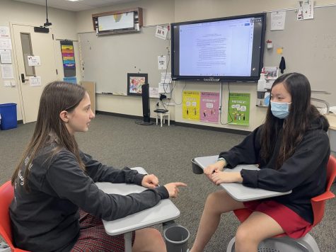 Two students were paired up to discuss their political views.