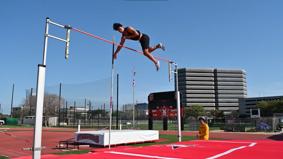 Senior Ryan Kao hurls himself over the pole vault crossbar.