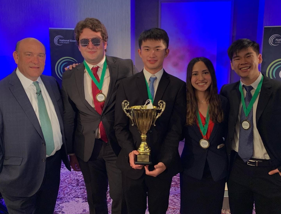 Seniors Oliver Lin, Ananya Das and Harris Lee and Duncan McLaren (22) won the National Economics Challenge on June 6.