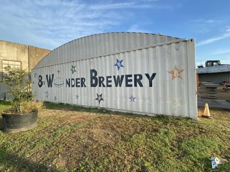 8th Wonder has an outdoor space filled with H-Town memorabilia where guests can chat and enjoy local brews.