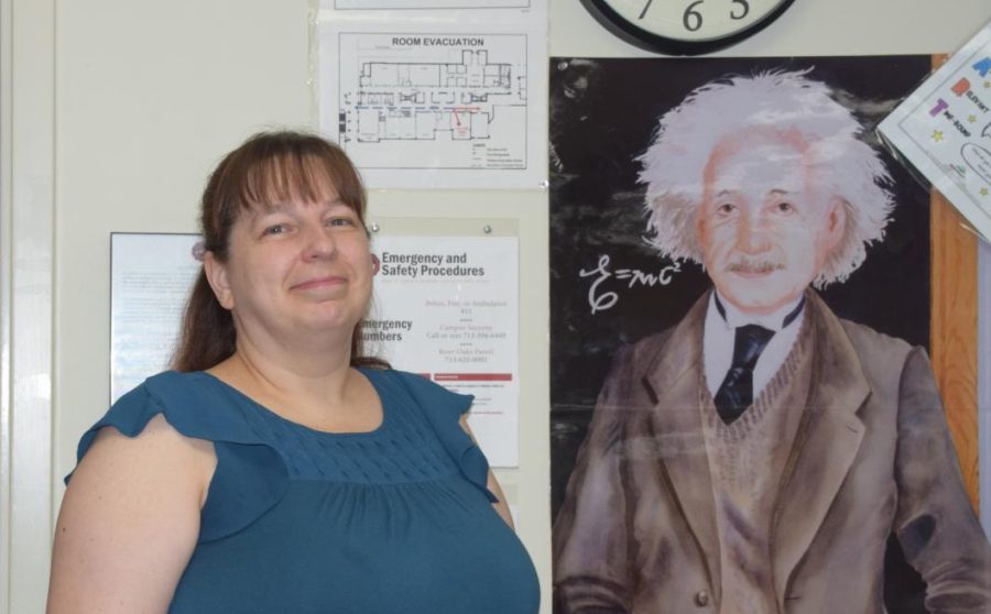 Ego has all sorts of photos hanging along the walls of her classroom, from physics memes to a full-body poster of Albert Einstein.