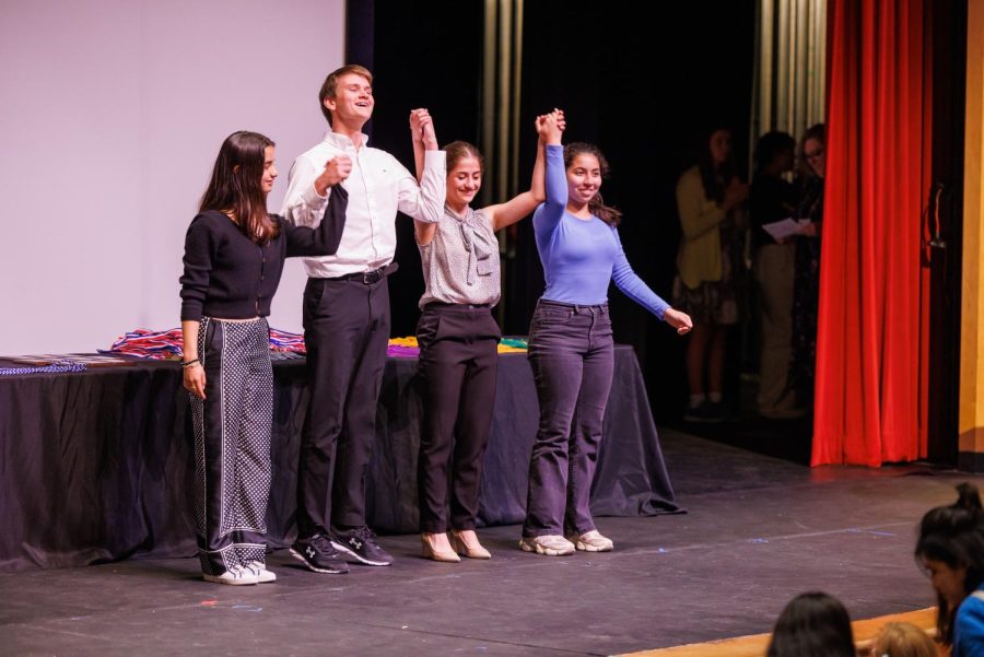 Sophomores Caroline Chiao and Sofia Aboul-Enein and freshmen Lachlan McFarland and Bryanna Micu take a bow after performing their skit at the awards ceremony.