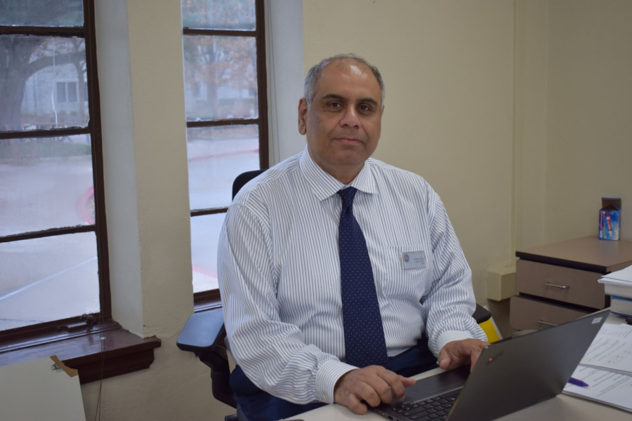 Math teacher Anand Tiwari occasionally gives palm readings to his students. 