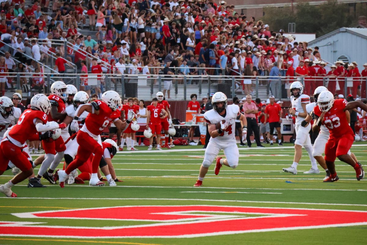 Junior Owen Sherrill narrows the distance to the end zone.
