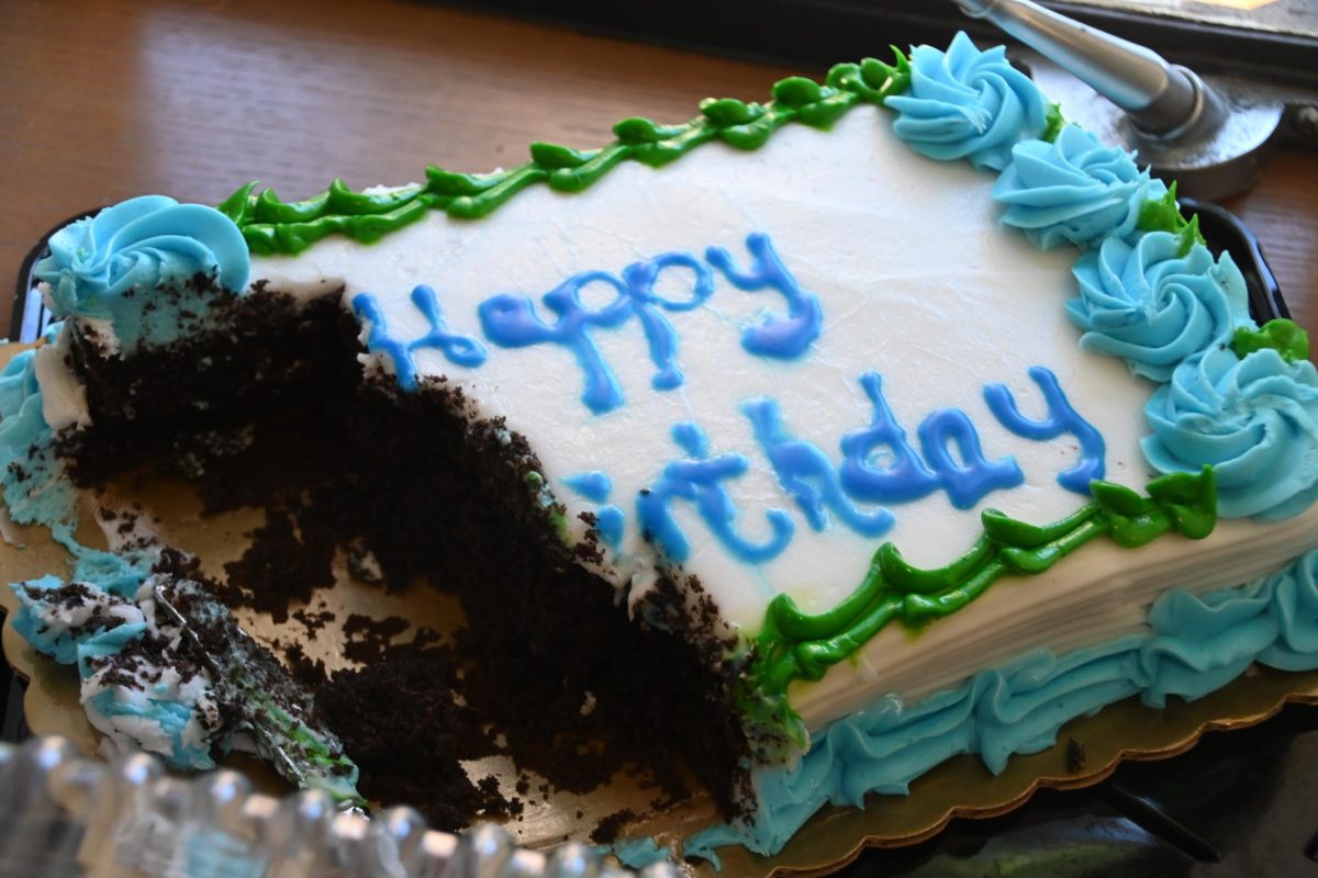 Students enjoyed the giant birthday cakes and many party hats given by The Friday Project.