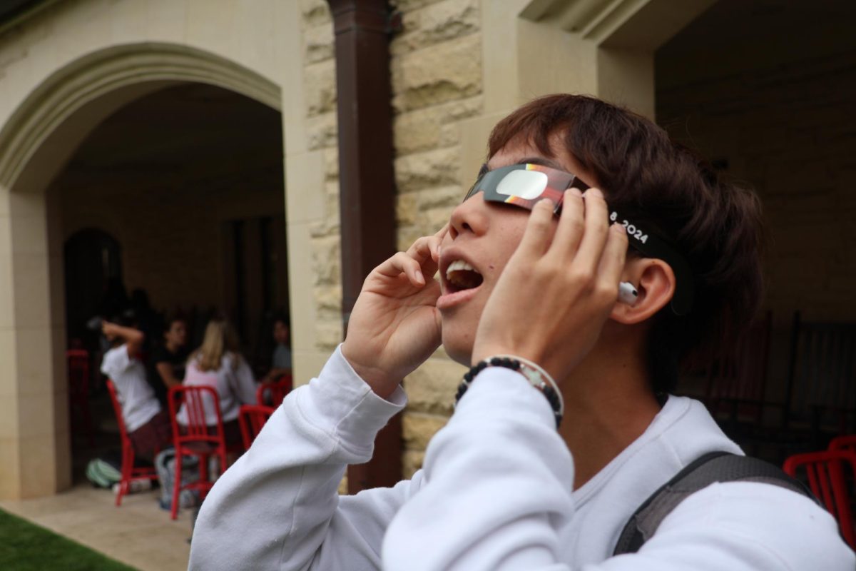 Sophomore Patrick Tsang marvels at the eclipse as it nears totality.